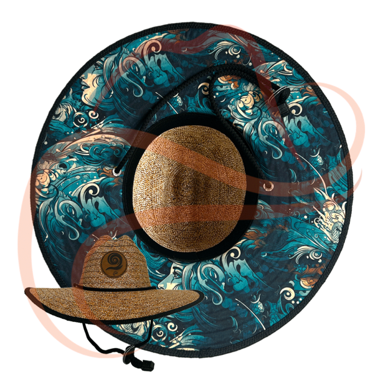 Imagen principal del Sombrero Viajero Faces, destacando el interior del ala con un llamativo estampado de rostros abstractos en tonos azules y beige, inspirado en el arte moderno.